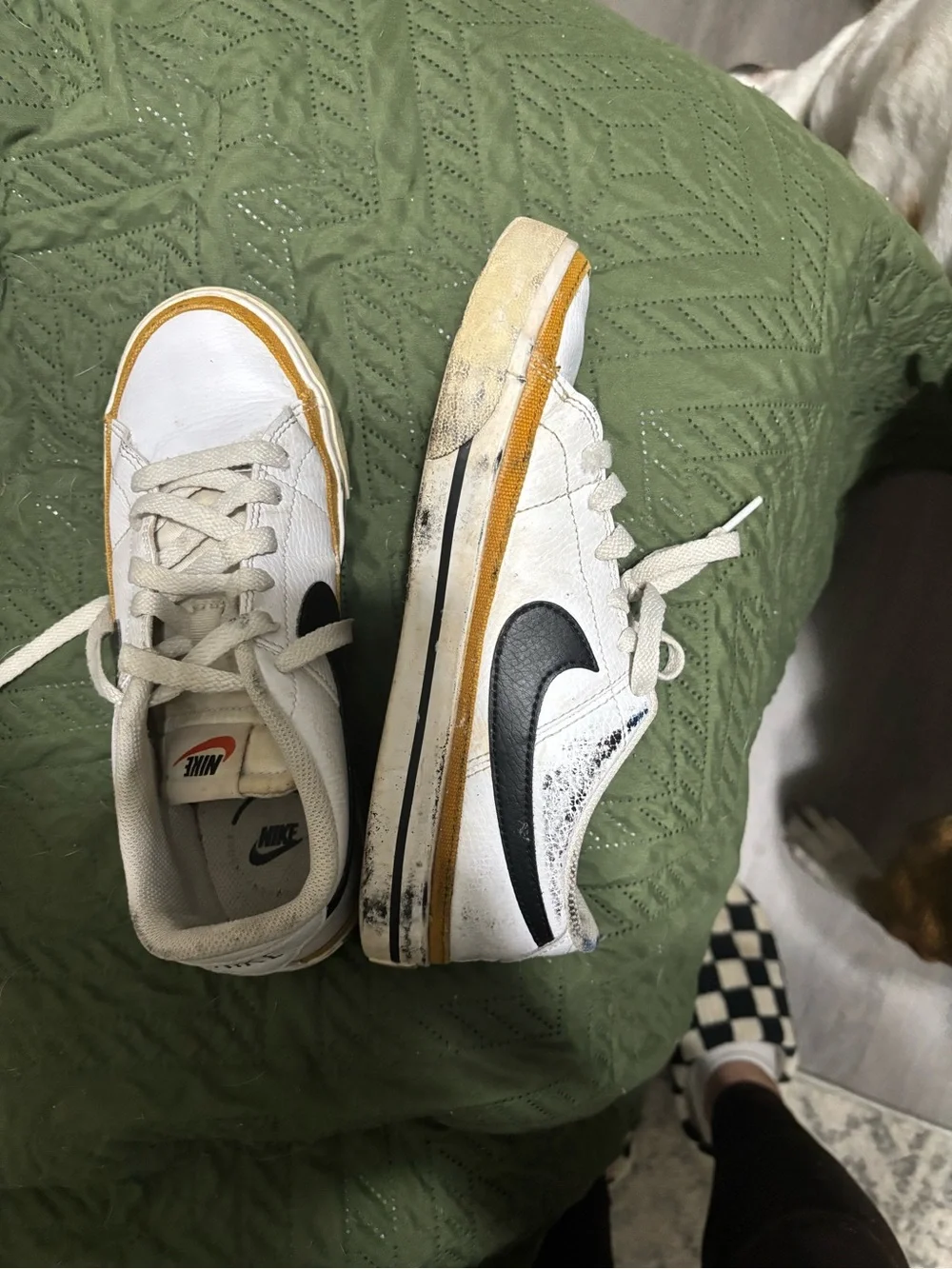 Nike White Leather Sneakers with Black Swoosh and Yellow Accent